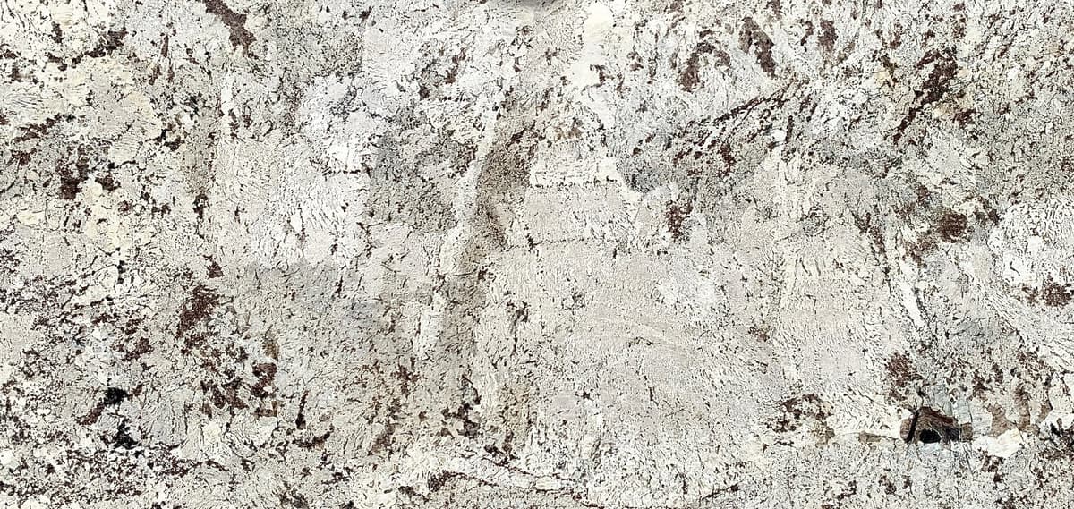 White and cream colored granite.