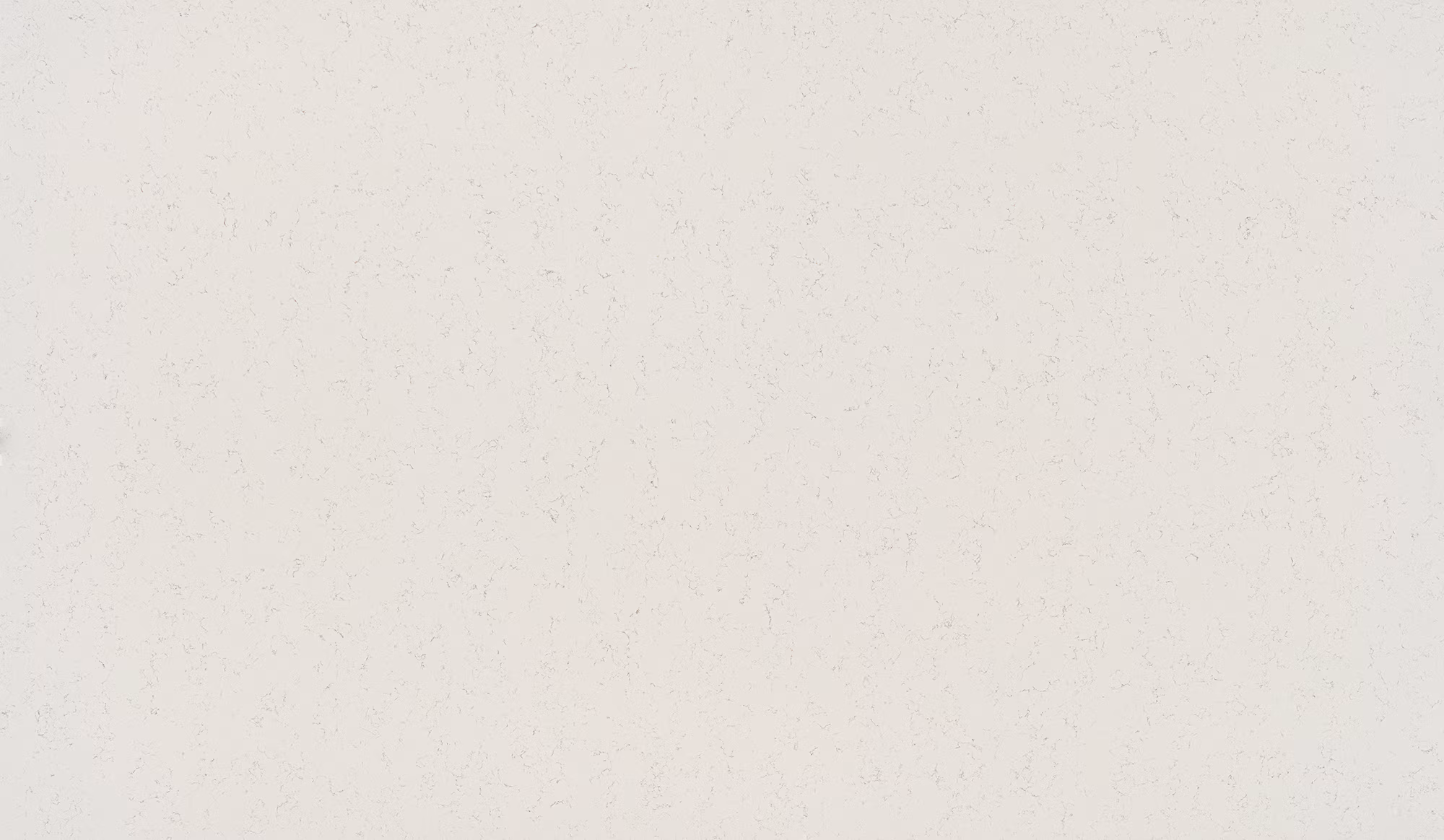 White quartz slab with silvery gray spotting.