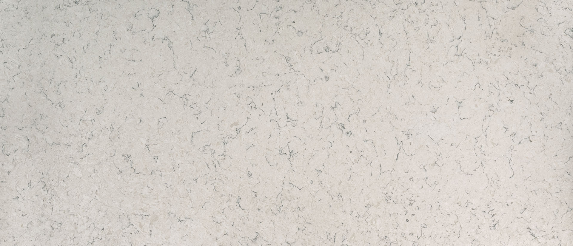 White quartz with sterling and gray veins.
