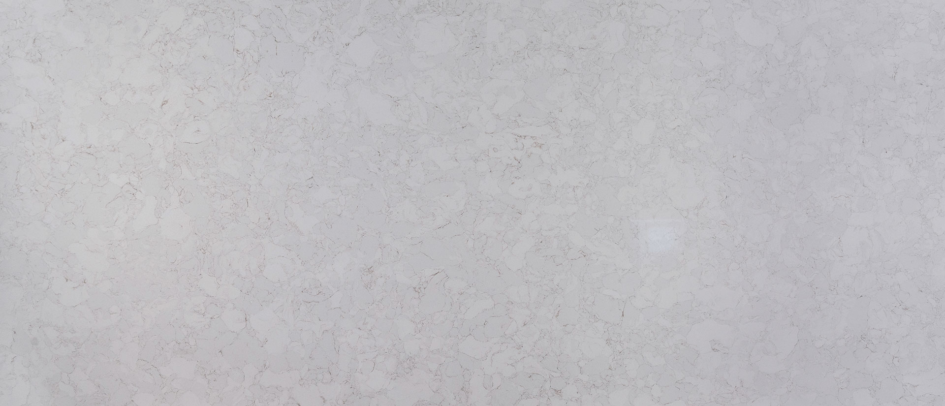 White quartz with sterling and gray veins.