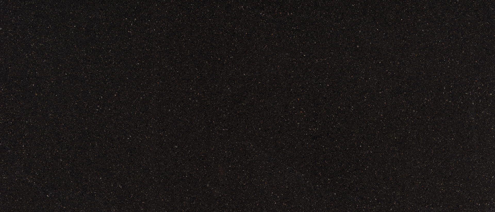 Black quartz with silver and gold glimmers.