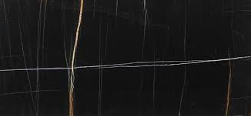 Black marble with white and gold veining.