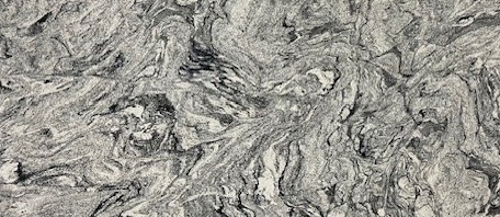 White and black granite with gray and silver swirl patterns.