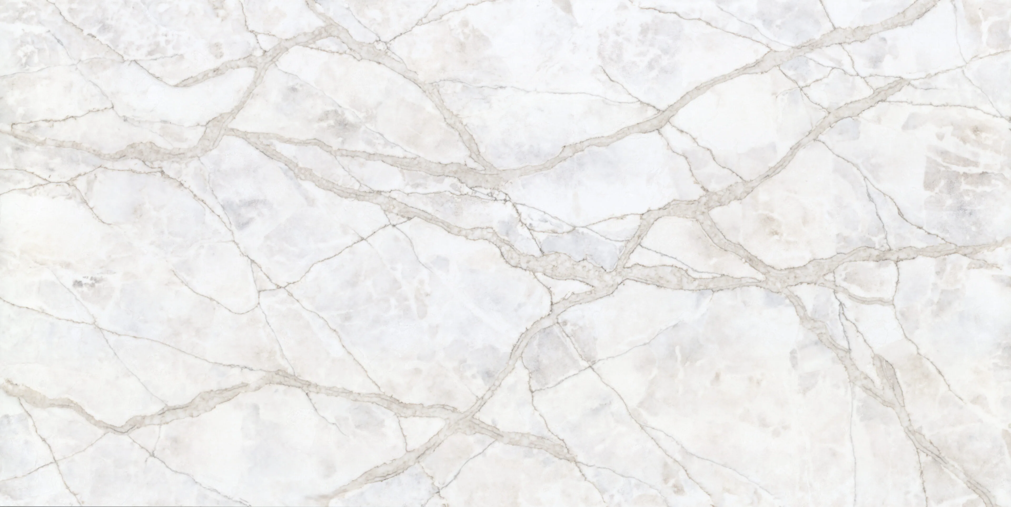 Introducing the Lumen Sky quartz slab, featuring a soft base of taupe, beige and coral with a luminous quality, reflecting light in a way that mimics the gentle glow of the sun. Ideal for creating a serene and uplifting atmosphere in any interior space.